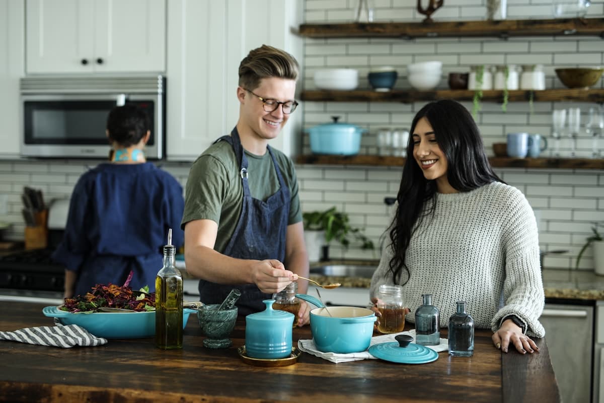 Professional kitchen with chefs preparing meals at scale